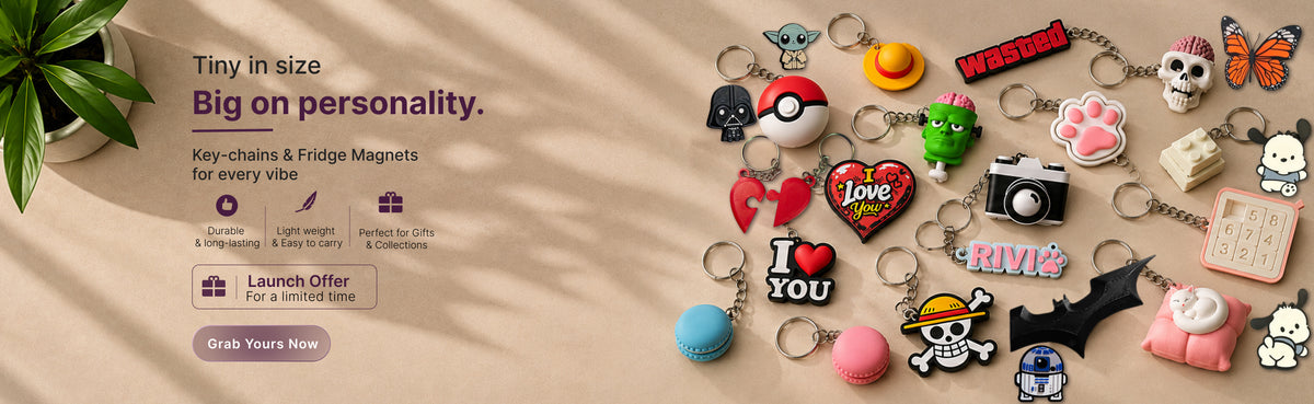 Homepage banner for 3D printed keychains and fridge magnets, showing an assortment of colorful character and novelty keychains, linking to the Keychains & Magnets collection.