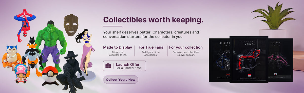 Homepage banner for 3D printed collectibles, showing superhero and character statues alongside framed F1 track prints, linking to the Collectibles collection.