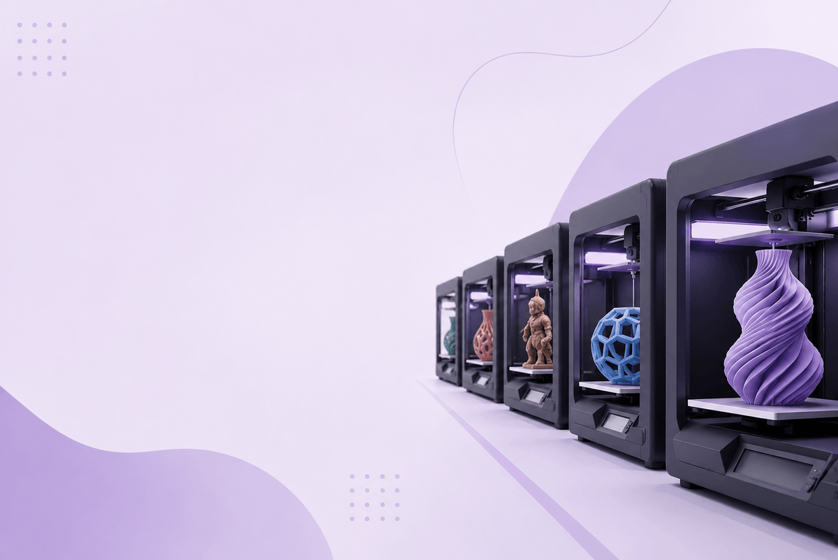 Row of 3D printers actively printing colorful figures, including a dragon, a robed figure, a geometric polyhedron, and a twisted vase, against a light purple gradient background.
