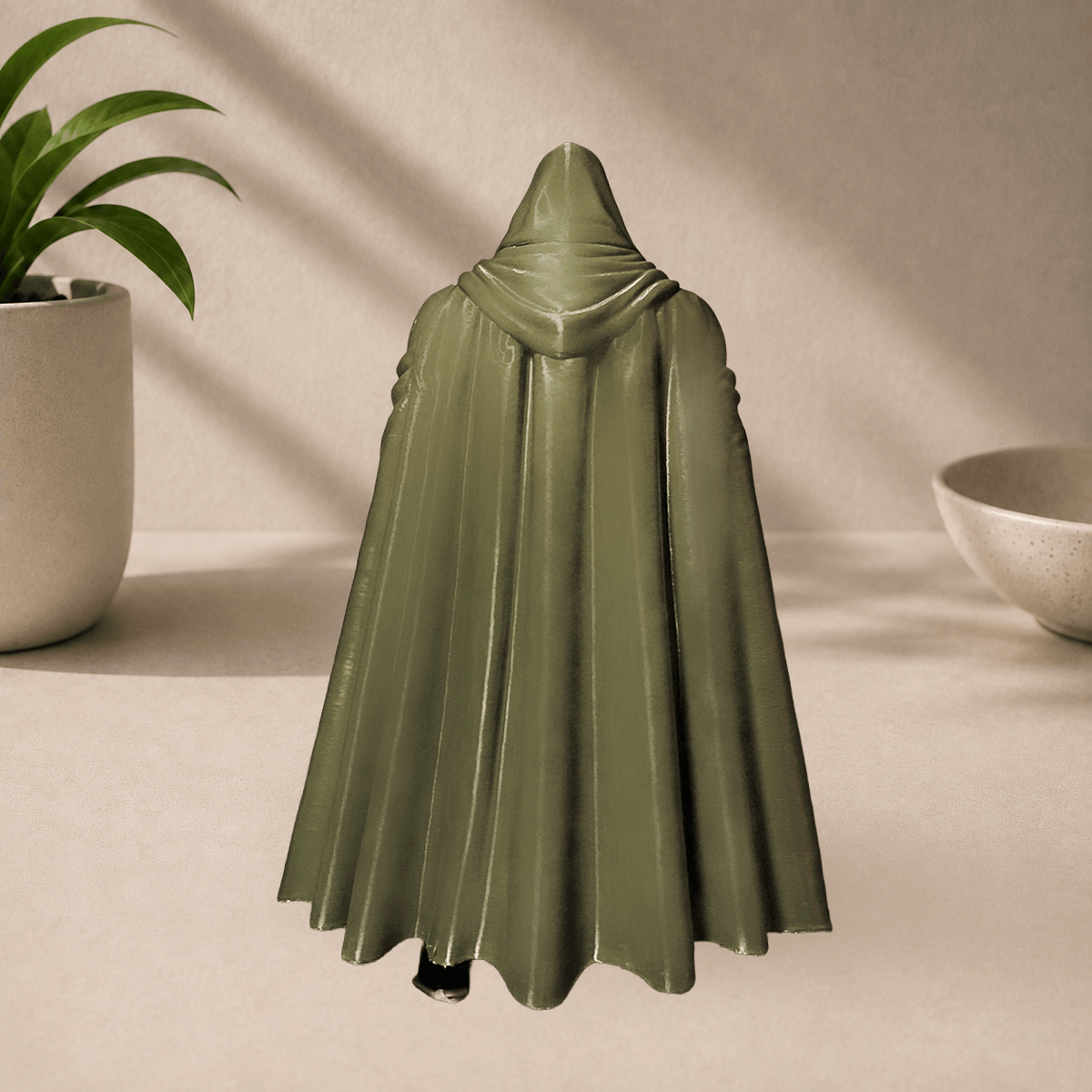 Back view of the 3D-printed Dr. Doom figure, showing the flowing green hooded cloak.
