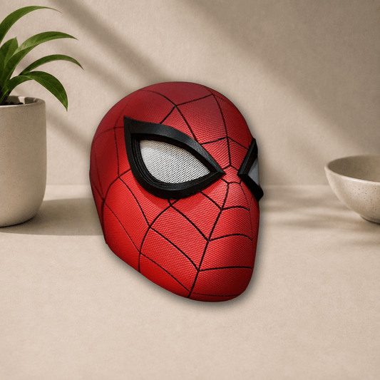 Side profile view of the red 3D-printed Spider-Man PS5 cosplay mask, showing its curved eye lens and webbed texture.